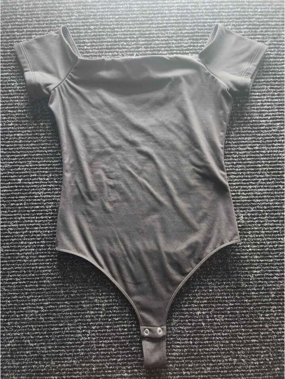 Reoria Black Off-the-Shoulder Short Sleeve Bodysuit